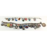 A sterling silver bracelet with numerous silver charms and silver flags to include 'Lermoos',