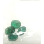 A group of 2.25 carats of oval cut emeralds