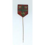 A 9 carat gold and enamel stick pin decorated coat of arms for Colchester, 3.6g