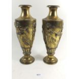 A pair of 19th century heavy brass vases cast Bacchus and nymphs dancing, 30cm