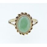 A 9 carat gold green stone ring, size K