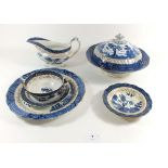 A group of Booths 'Real Old Willow' dinner ware comprising: thirteen dinner plates, two tureens, two