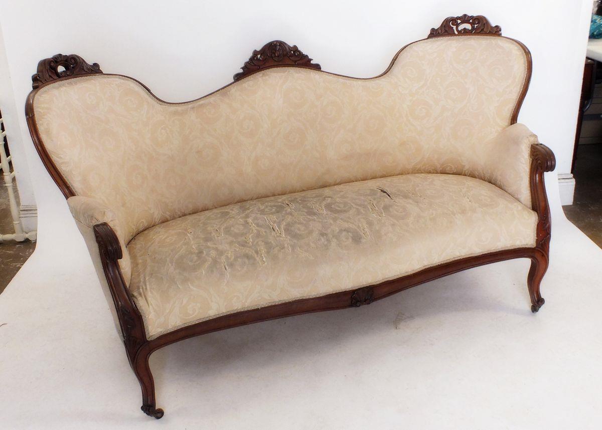 A Victorian triple arch back settee with scrollwork carved decoration, scroll over arms and supports - Image 2 of 3