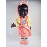 A Pedigree black doll, 53cm