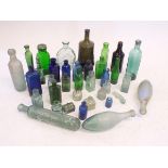 A quantity of antique chemist bottles, poison bottles etc.