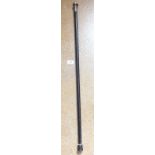 A silver topped walking cane