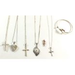 Seven silver pendants and five silver chains plus a silver dolphin bangle