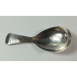 A Georgian silver bright cut engraved caddy spoon, London 1806 by John Lambe, 9g