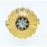 An unusual yellow metal flower form ring with a central sapphire within petal surround, size L, 4.5g