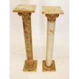 A pair of vintage onyx and gilt pedestal columns, 91cm tall