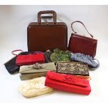 A box of vintage ladies handbags