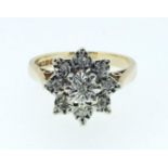 A 9 carat gold illusion set diamond cluster ring, size I