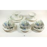 A Bell China tea service decorated spring flowers comprising: six cups and saucers, six tea