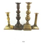Four Victorian/Georgian brass candlesticks