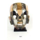A Mexican stone death mask, 22cm