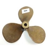 An early 20th century bronze three blade yacht propeller by Stuart, stamped 8x7 LH.