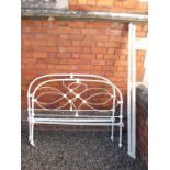 A pair of Victorian white painted wrought iron bed ends and irons