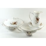 A Royal Worcester dinner service with brown and gilt floral and fruit decoration, comprising:- six