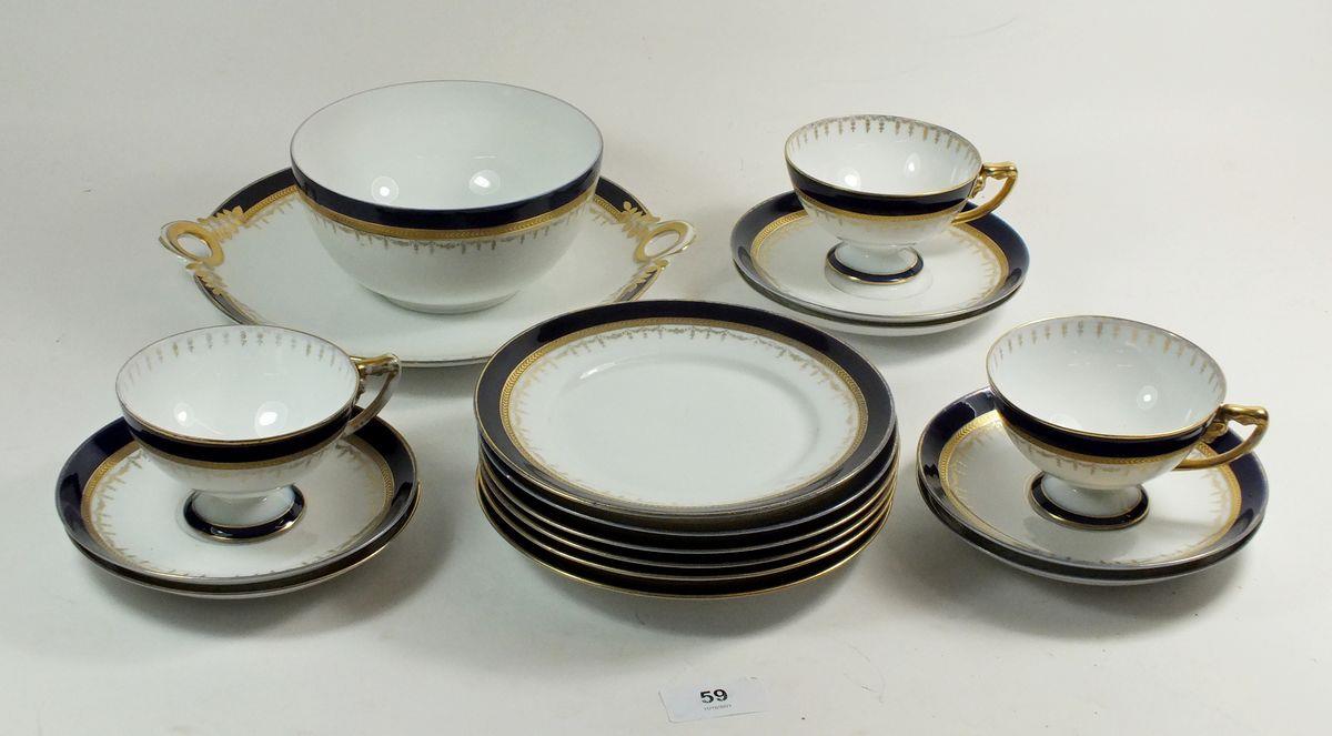 A Rosenthal blue and gilt part tea service comprising: three cups and six saucers, six tea plates