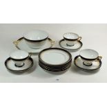 A Rosenthal blue and gilt part tea service comprising: three cups and six saucers, six tea plates