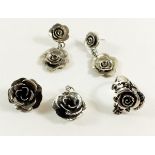 A group of jewellery to include a silver 'rose' ring size k, a silver 'rose' pendant and an unmarked