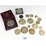 A group of coins to include 1887 crown, 1887 half crown, Marie Theresa thaler re-strike, shillings