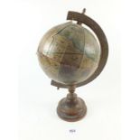 A small globe in distressed condition