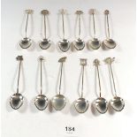 A set of twelve Chinese silver teaspoons with symbolic terminals