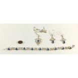 A continential jewellery set consisting of matching earrings, bracelet and necklace plus a part