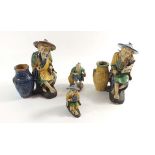 A group of four Japanese pottery figures