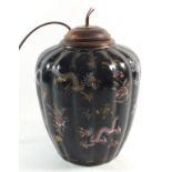 A Chinese vase painted dragons and flowers on a black ground, now converted to a table lamp