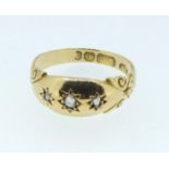 An 18 carat gold gypsy ring set three old cut diamonds, 2.5g, size M