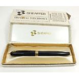 A cased Sheaffer pen