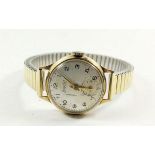 A 9 carat gold ladies Accurist wrist watch with plated strap