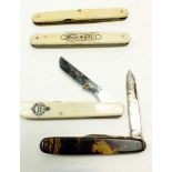 Two ivory 'Corn' knives and one other, plus a tortoiseshell knife