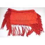 A 1920's long red silk embroidered wrap with fringe, 270 x 36