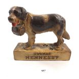 A vintage Cognac Hennessy bar advertising figure in the form of a St Bernard dog, 21cm tall
