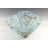 A studio glass frilled and streaked bowl, signed, 23cm diameter