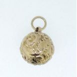 A 9 carat gold spherical charm, unmarked but tested, 1.3g