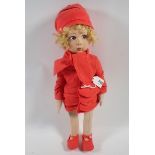 A Lenci doll with scarlet coat, hat and shoes, 41cm circa 1935