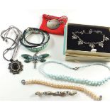 A silver marcasite necklace in original box, a mother of pearl and silver necklace and various other