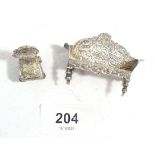 A Dutch silver miniature settee (af) and chair with cherub decoration, English import marks for