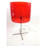 A 1970s to 1980s modernist chrome table lamp with red perspex shade, 45cm