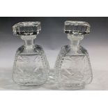 A pair of cut glass decanters