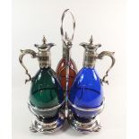 A 19th century silver plated decanter stand with three coloured glass claret decanters