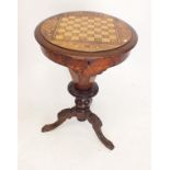 A Victorian walnut circular games and work table with Tunbridgeware and marquetry chess board top