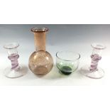 A pair of Cowdy glass candlesticks, a carafe and a small bowl