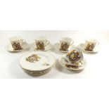 A set of five Queen Elizabeth commemerative cups and saucers and tea plates