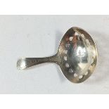A Georgian silver bright cut engraved caddy spoon with pierced bowl, London 1797, 6.5g