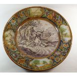 A French faience large charger by Antoine Montagnon - repaired, 52cm diameter
